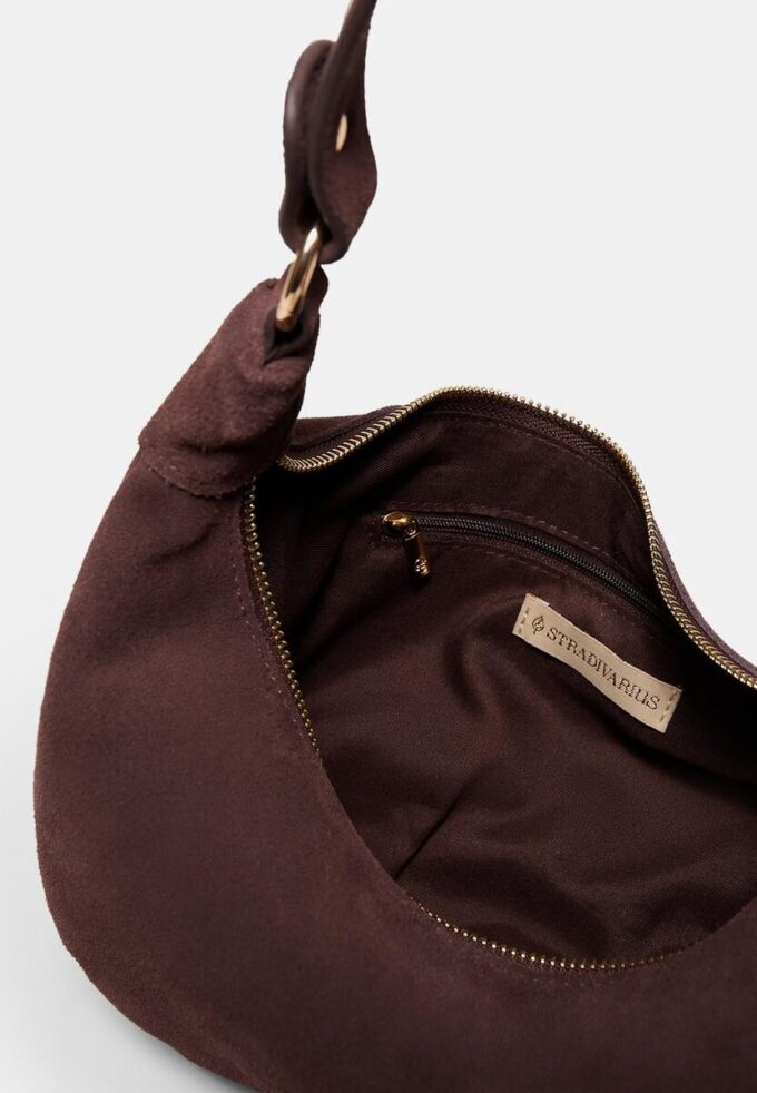 100 % Leder-Umhängetasche mit Nieten 100 % Leder-Umhängetasche mit Nieten