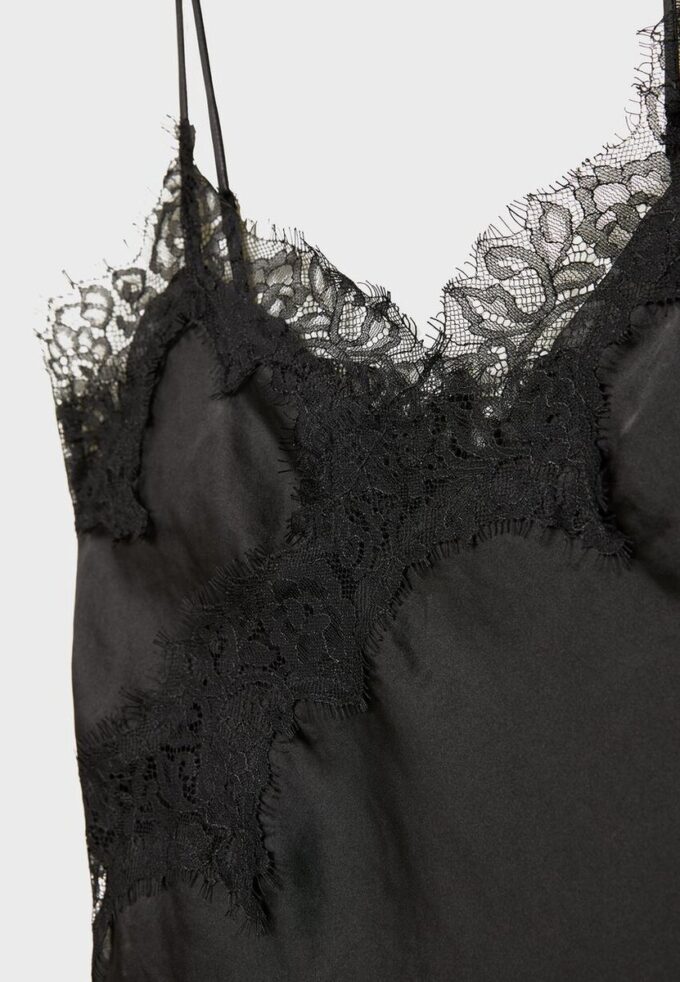 Asymmetrisches Spitzen-Oberteil mit Trägern Asymmetrisches Spitzen-Oberteil mit Trägern