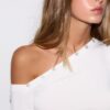 Asymmetrisches T-Shirt mit Knöpfen Asymmetrisches T-Shirt mit Knöpfen