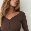 Bluse mit Knöpfen