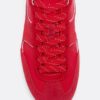 Flache Sneaker mit Details aus Leder