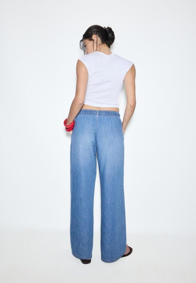 Fließende Denim-Hose mit Kordelzug Fließende Denim-Hose mit Kordelzug