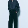 Fließende, elegante Hose mit geradem Bein und Gürtel Fließende, elegante Hose mit geradem Bein und Gürtel