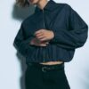 Fließende, elegante Hose mit geradem Bein und Gürtel Fließende, elegante Hose mit geradem Bein und Gürtel