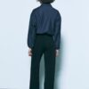 Fließende, elegante Hose mit geradem Bein und Gürtel Fließende, elegante Hose mit geradem Bein und Gürtel
