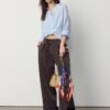 Fließende Hose mit Bügelfalte und Bindegürtel Fließende Hose mit Bügelfalte und Bindegürtel