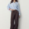 Fließende Hose mit Bügelfalte und Bindegürtel Fließende Hose mit Bügelfalte und Bindegürtel