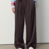 Fließende Hose mit Bügelfalte und Bindegürtel Fließende Hose mit Bügelfalte und Bindegürtel