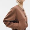 Jacke mit Puffärmeln und Rundhalsausschnitt Jacke mit Puffärmeln und Rundhalsausschnitt