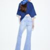 Jeans mit niedriger Leibhöhe und Nahttaschen Jeans mit niedriger Leibhöhe und Nahttaschen