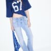 Jeans mit niedriger Leibhöhe und Nahttaschen Jeans mit niedriger Leibhöhe und Nahttaschen