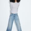 Jeans mit niedriger Leibhöhe und Wide Leg mit Stern-Detail Jeans mit niedriger Leibhöhe und Wide Leg mit Stern-Detail