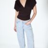 Jeans mit niedriger Leibhöhe und Wide Leg mit Strasssteinen Jeans mit niedriger Leibhöhe und Wide Leg mit Strasssteinen