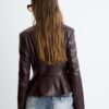 Kragenloser Blazer mit Peplum in Lederoptik Kragenloser Blazer mit Peplum in Lederoptik