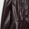 Kragenloser Blazer mit Peplum in Lederoptik Kragenloser Blazer mit Peplum in Lederoptik