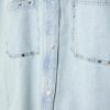 Kurzes Denim-Overshirt mit Nieten Kurzes Denim-Overshirt mit Nieten