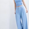 Rustikale Hose mit Wide Leg und verstellbaren Knöpfen Rustikale Hose mit Wide Leg und verstellbaren Knöpfen
