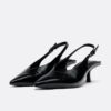 Schuhe mit V-Ausschnitt und Kitten-Absatz