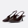 Schuhe mit V-Ausschnitt und Kitten-Absatz