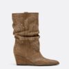 Stiefel mit Keilschuhen aus Leder Stiefel mit Keilschuhen aus Leder