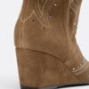 Stiefel mit Keilschuhen aus Leder Stiefel mit Keilschuhen aus Leder