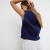 Strickweste mit gepolsterten Schultern Strickweste mit gepolsterten Schultern